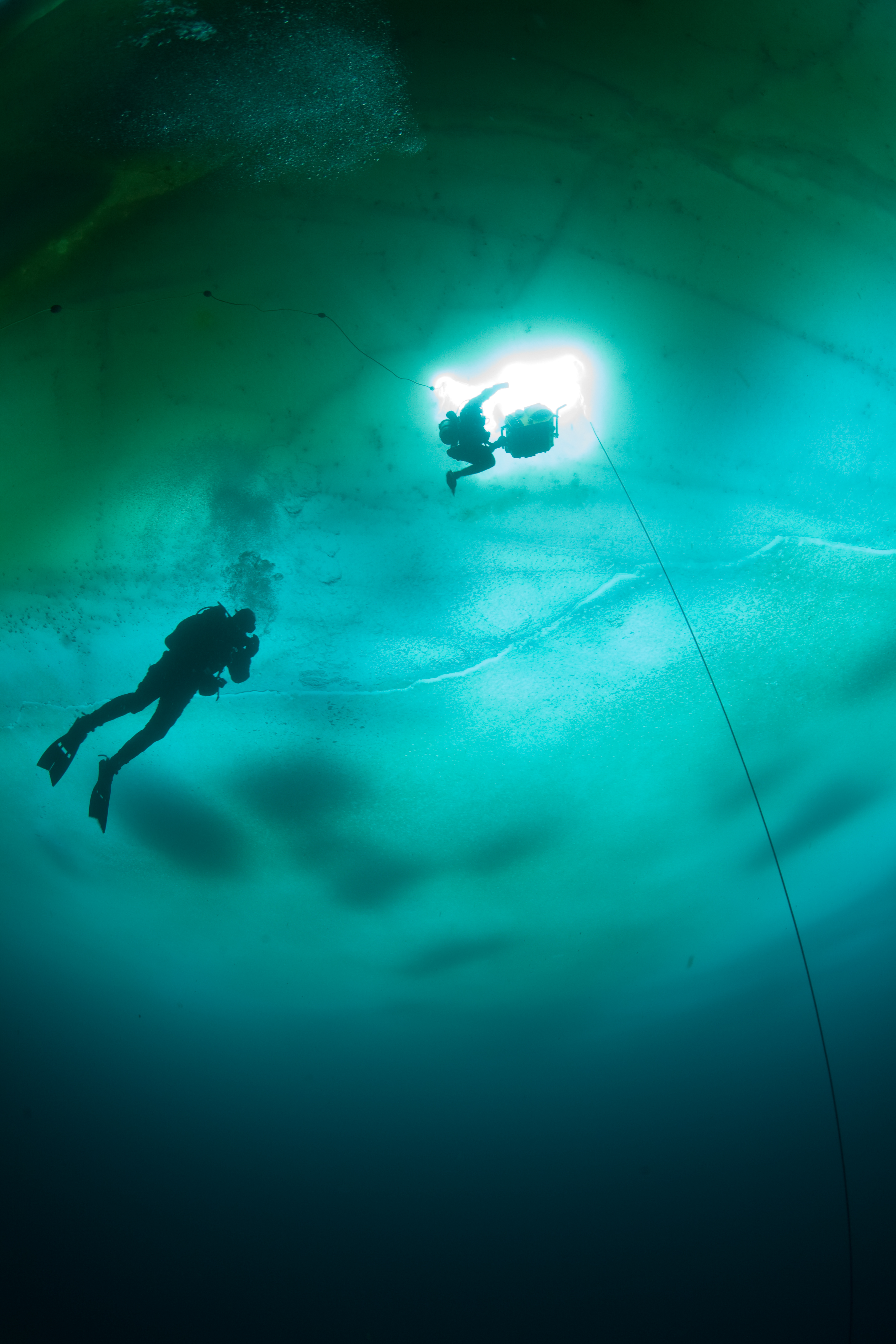 Adam Ravetch diving under arctic ice